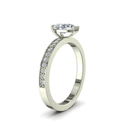 Bague solitaire 0.80 carat or blanc diamant naturel poire et diamants naturels ronds Noémie